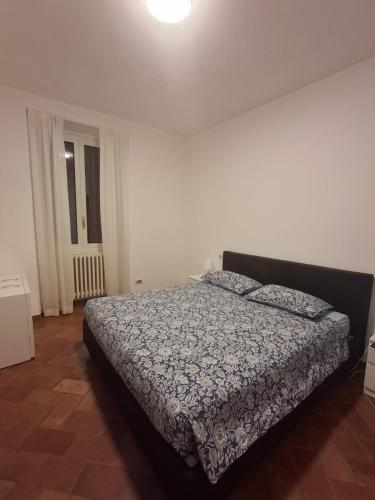 Postel nebo postele na pokoji v ubytování GIULIA e ANDREA