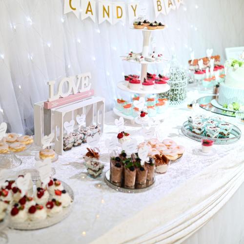 a table with cakes and cupcakes and a candy bar at Vegas Hriňová Penzión in Hriňová