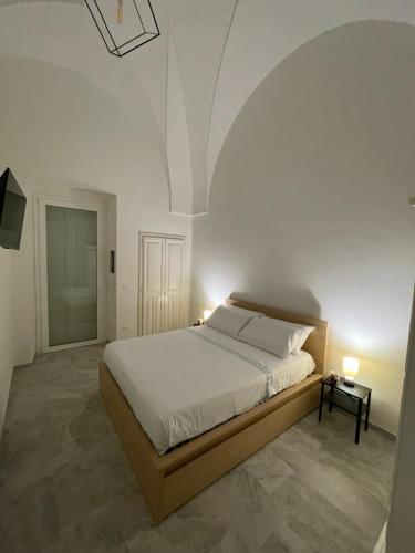Ένα ή περισσότερα κρεβάτια σε δωμάτιο στο Casa Alfredo