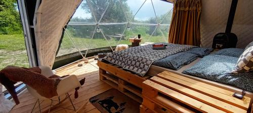 Кровать или кровати в номере GLAMPING SLOVENSKO