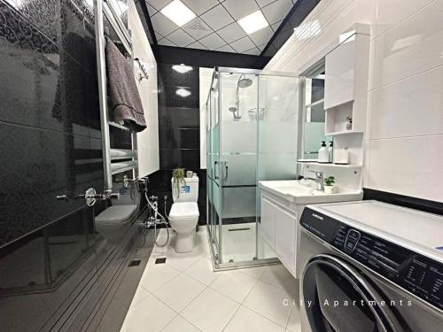 Kuhinja ili čajna kuhinja u objektu Grey Suite Apartment