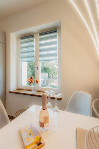 a white table with a window in a room at PauliDrei in Leipzig