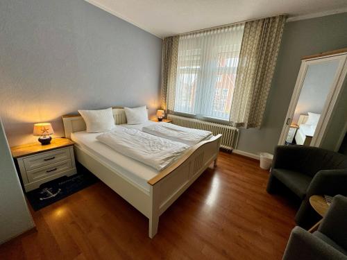 Postel nebo postele na pokoji v ubytování Hotel Sophien-Café
