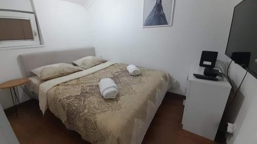 Postel nebo postele na pokoji v ubytování Vidikovac