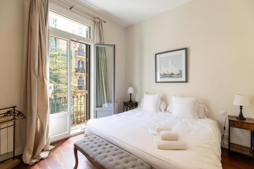 Postel nebo postele na pokoji v ubytování BCN Apartments 41