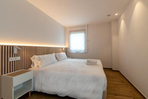Ένα ή περισσότερα κρεβάτια σε δωμάτιο στο Suites Ecojebar