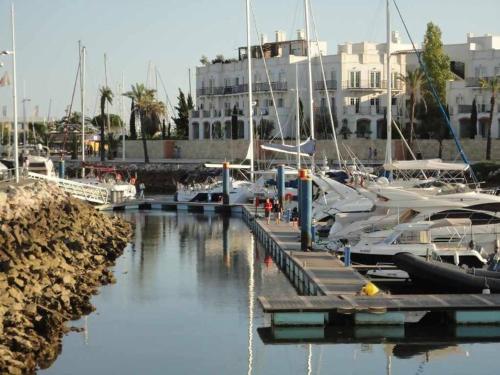 a group of boats docked at a marina at VilamouraSun Aquamar Penthouse 601 in Quarteira