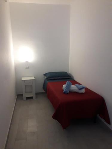 Ένα ή περισσότερα κρεβάτια σε δωμάτιο στο NAHAR HOME