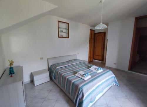 Voodi või voodid majutusasutuse Eden tra i limoni toas