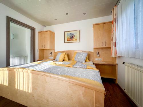 Postel nebo postele na pokoji v ubytování Gästehaus im Wiesengrund