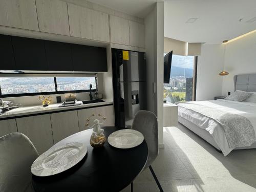 Ένα ή περισσότερα κρεβάτια σε δωμάτιο στο Nuevo Studio- Piso 17 Vista La Carolina - Edificio Harmony