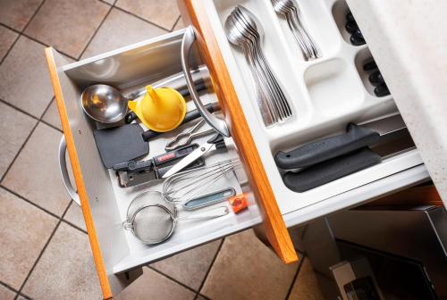 a drawer full of kitchen utensils in a drawer at Chalet Rosita in Livigno