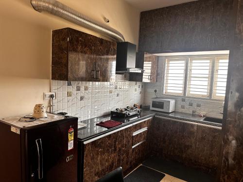 Η κουζίνα ή μικρή κουζίνα στο DEEYA Guest House