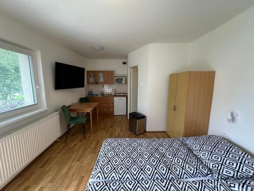 Postel nebo postele na pokoji v ubytování Chatka Ariel