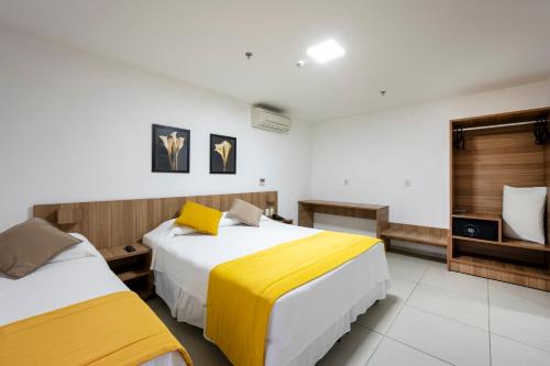 Ένα ή περισσότερα κρεβάτια σε δωμάτιο στο Villa Park Hotel Recife