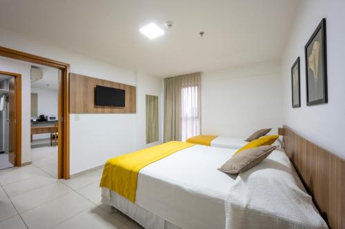 Ένα ή περισσότερα κρεβάτια σε δωμάτιο στο Villa Park Hotel Recife