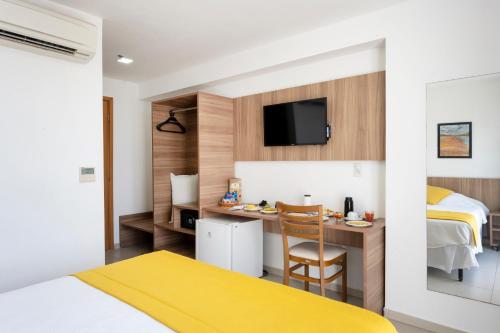Ένα ή περισσότερα κρεβάτια σε δωμάτιο στο Villa Park Hotel Recife