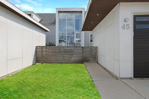 a house with a lawn in front of a house at Turtle River Retreat in Ottawa