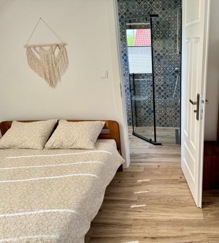 Ein Bett oder Betten in einem Zimmer der Unterkunft Noclegi DobraNocka