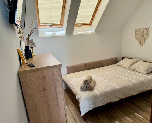 Ein Bett oder Betten in einem Zimmer der Unterkunft Noclegi DobraNocka