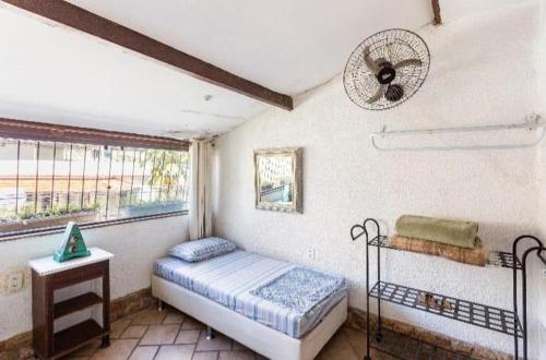 Ένα ή περισσότερα κρεβάτια σε δωμάτιο στο Hostel Espaço Grajaú