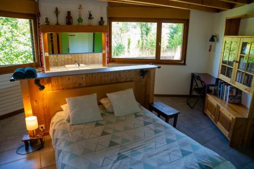 Postel nebo postele na pokoji v ubytování Le Grand Nid - Gîte La Maison Alvéole
