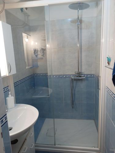 a bathroom with a shower and a sink at Orizzonti in Trieste