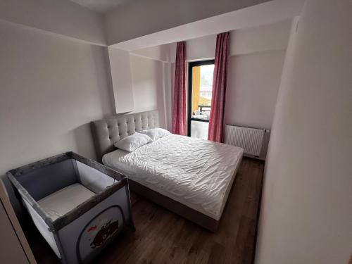 Ένα ή περισσότερα κρεβάτια σε δωμάτιο στο Apartman Rita
