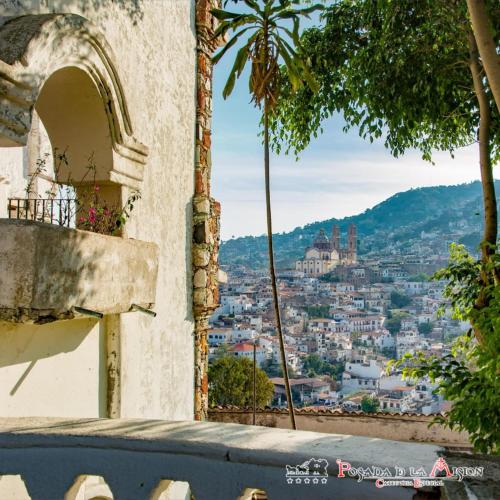 a view of the city from a building at Posada de la Mision, Hotel Museo y Jardin in Taxco de Alarcón