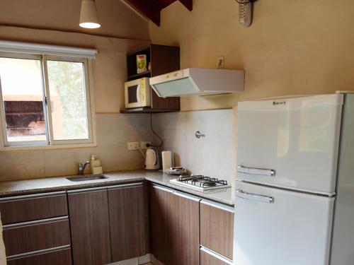 Η κουζίνα ή μικρή κουζίνα στο Cabanas Loma Bonita