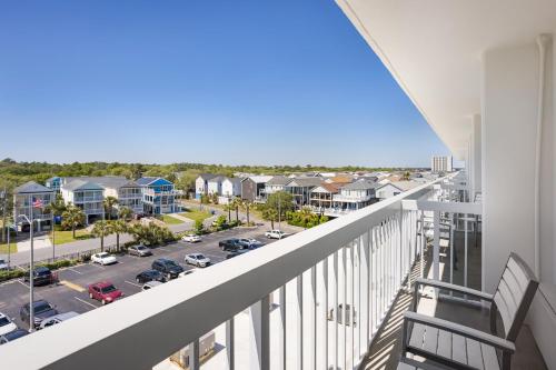 a balcony with a view of a parking lot at Holiday Inn Resort Oceanfront at Surfside Beach by IHG in Myrtle Beach