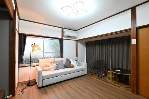 Postel nebo postele na pokoji v ubytování 天然温泉付きの一棟貸切 ペットOk 無料駐車場有 最大10名