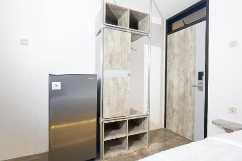 Una cama o camas en una habitación de Dparagon Senopati