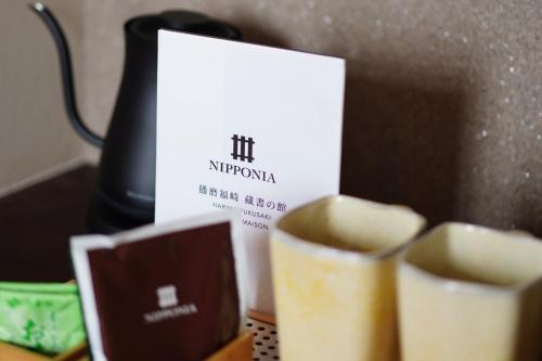 a box of chocolates sitting next to a blender at NIPPONIA HARIMA FUKUSAKI ZOUSHONO YAKATA in Fukusaki