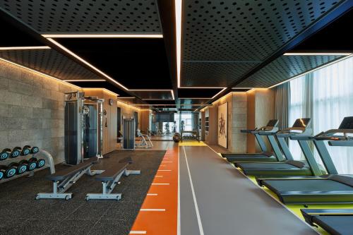 a gym with a row of chairs and desks at Four Points by Sheraton Huzhou in Huzhou