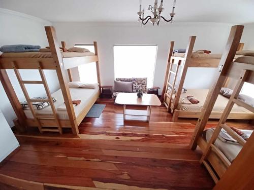 Ένα ή περισσότερα κρεβάτια σε δωμάτιο στο Hostel Mochiliers Bed and Breakfast