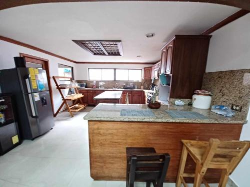 Η κουζίνα ή μικρή κουζίνα στο Hostel Mochiliers Bed and Breakfast