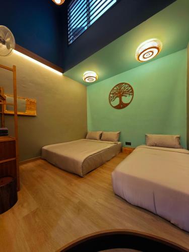 Ένα ή περισσότερα κρεβάτια σε δωμάτιο στο Cozy Austin - 10 mins from Aeon Tebrau City