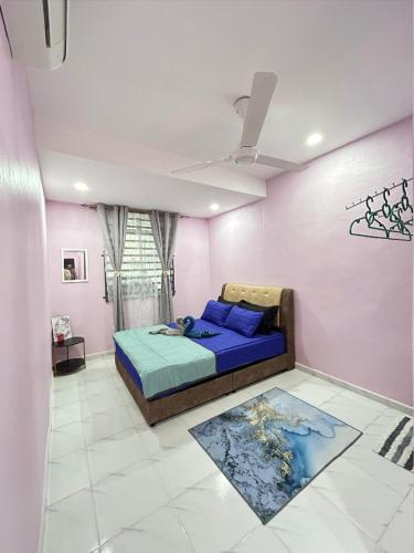 Katil atau katil-katil dalam bilik di Ammaiti Homestay Kulim