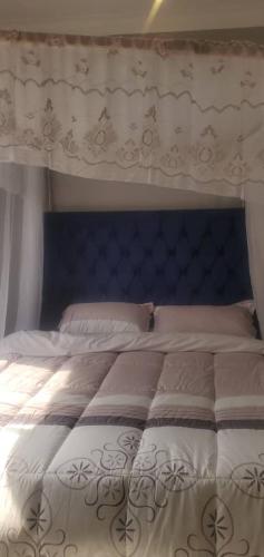En eller flere senge i et værelse på Bbunga cozy apartment