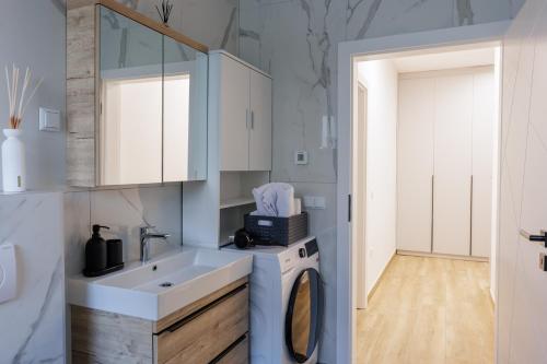 Kuchyň nebo kuchyňský kout v ubytování Apartman BarCode