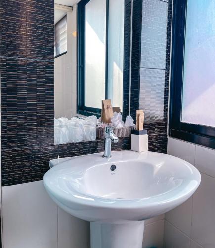 Ein Badezimmer in der Unterkunft Baik Suite