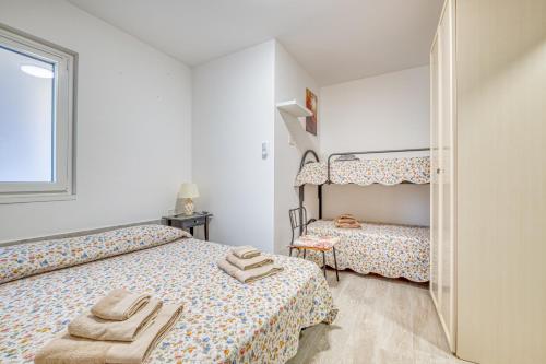 Ένα ή περισσότερα κρεβάτια σε δωμάτιο στο Merlo Apartments