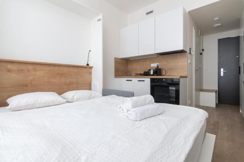 Postel nebo postele na pokoji v ubytování Studio Mozart, Free Onsite Parking, Air Conditioning, 1Gbs WiFi