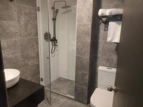 Koupelna v ubytování Telang Usan Hotel Kuching