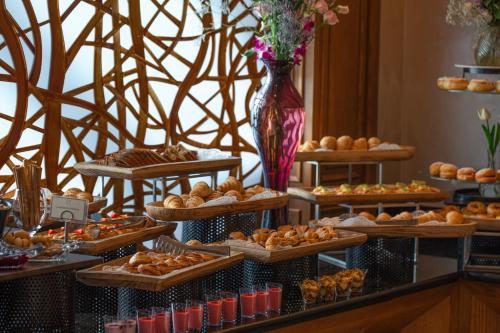 a buffet of breads and pastries on display at Bristol Hotel in Amman