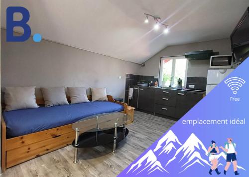 a bedroom with a bed with mountains on it at Cosy F2 in Passy