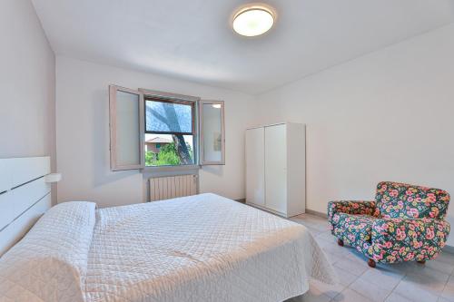 Ένα ή περισσότερα κρεβάτια σε δωμάτιο στο Villa Lorenzo - Goelba