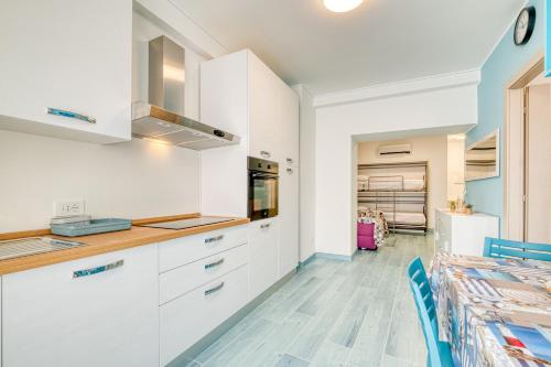 Η κουζίνα ή μικρή κουζίνα στο Merlo Apartments