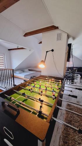 a lego soccer game on display in a room at Domek w Dolinie Sanu in Witryłów